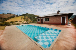 Chacara c piscina e vista para Cach dos PretosSP